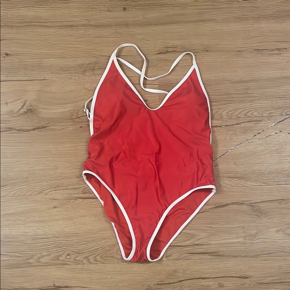 Women’s Plunging Neck Line One Piece Swimsuit